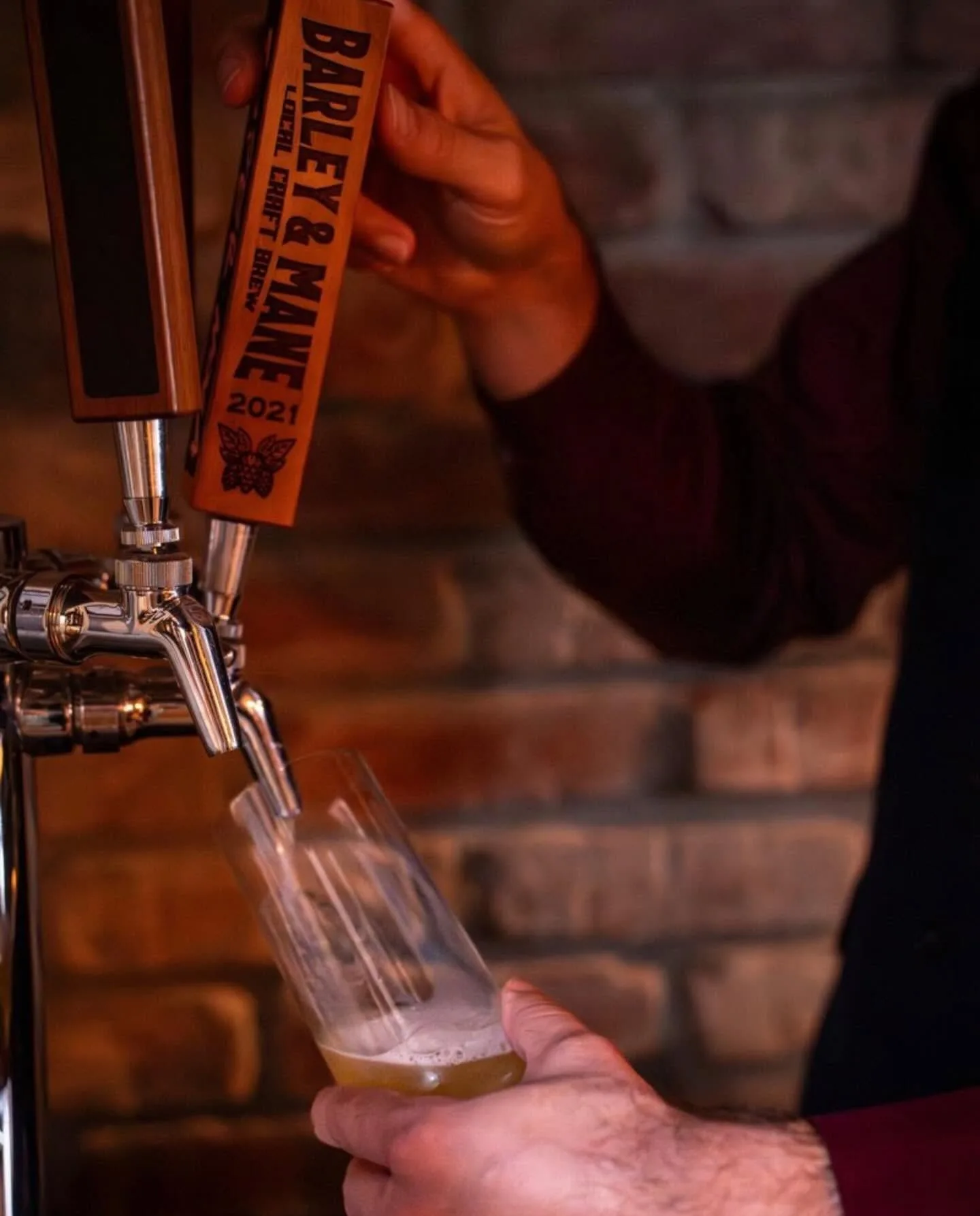 A cold beer poured at the chair