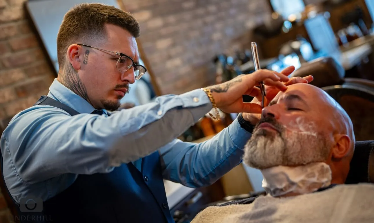 A straight razor shave in progress