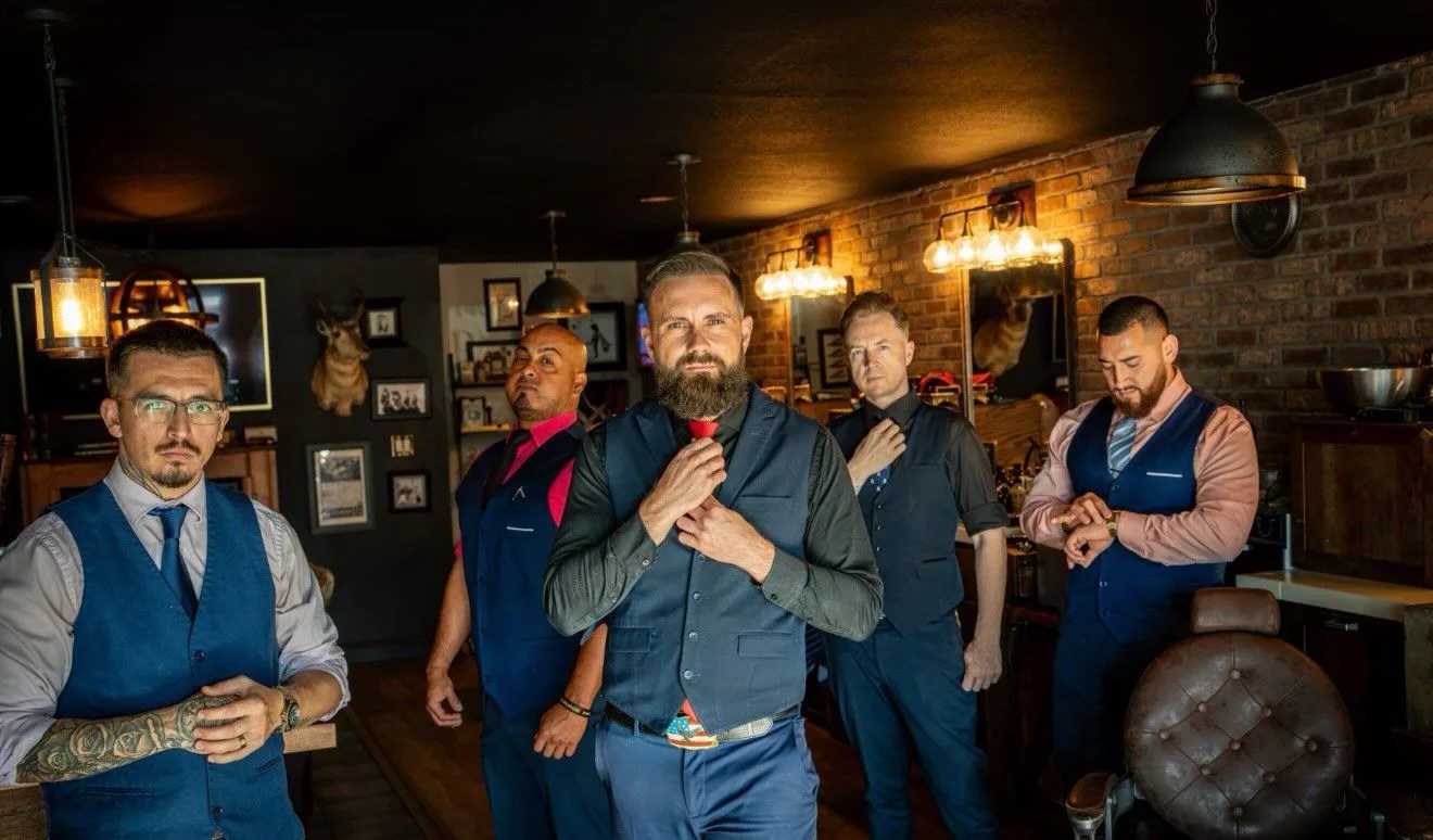 The barbers of Barley and Mane in the shop lounge
